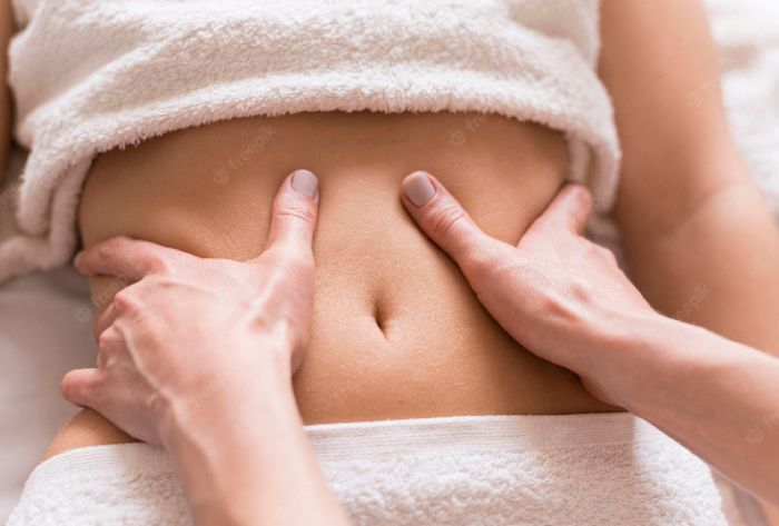 Massage giảm mỡ bụng dưới