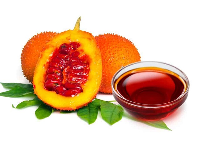 làm đẹp da mặt bằng dầu gấc